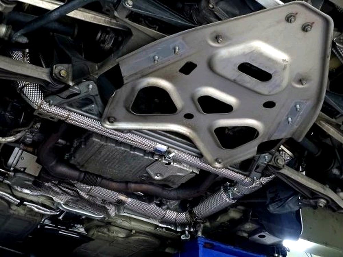 Porsche 997.2 underbody X-pipe installed — customer feedback