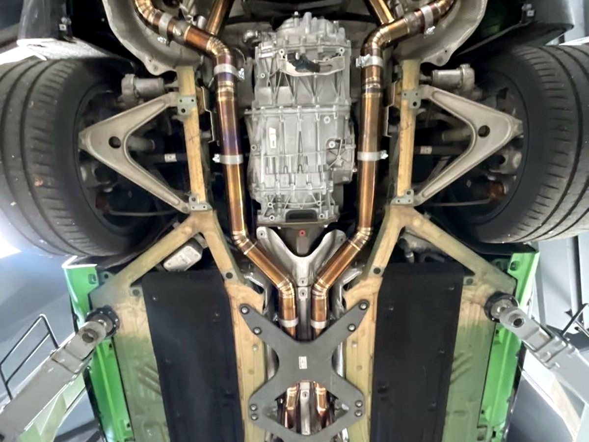 Mercedes-AMG GT R underbody with OUCHI titanium exhaust — customer installation