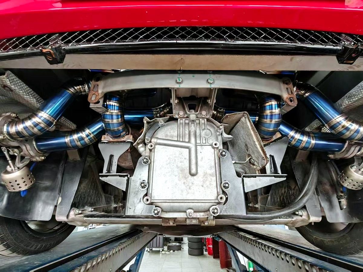 Ferrari F430 rear underbody with OUCHI titanium exhaust — customer installation