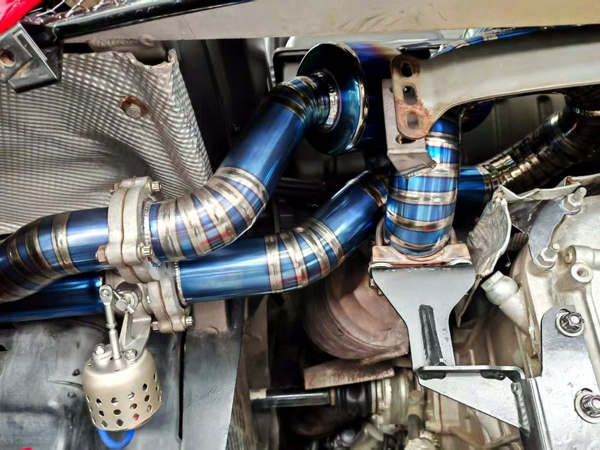 Ferrari F430 titanium exhaust valve section — customer installation detail