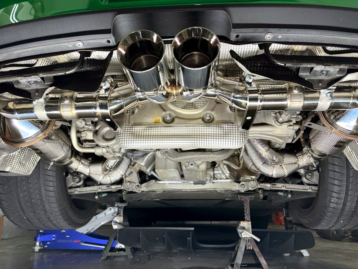 Porsche 992 GT3 underbody with OUCHI centre-exit rear silencer — customer installation