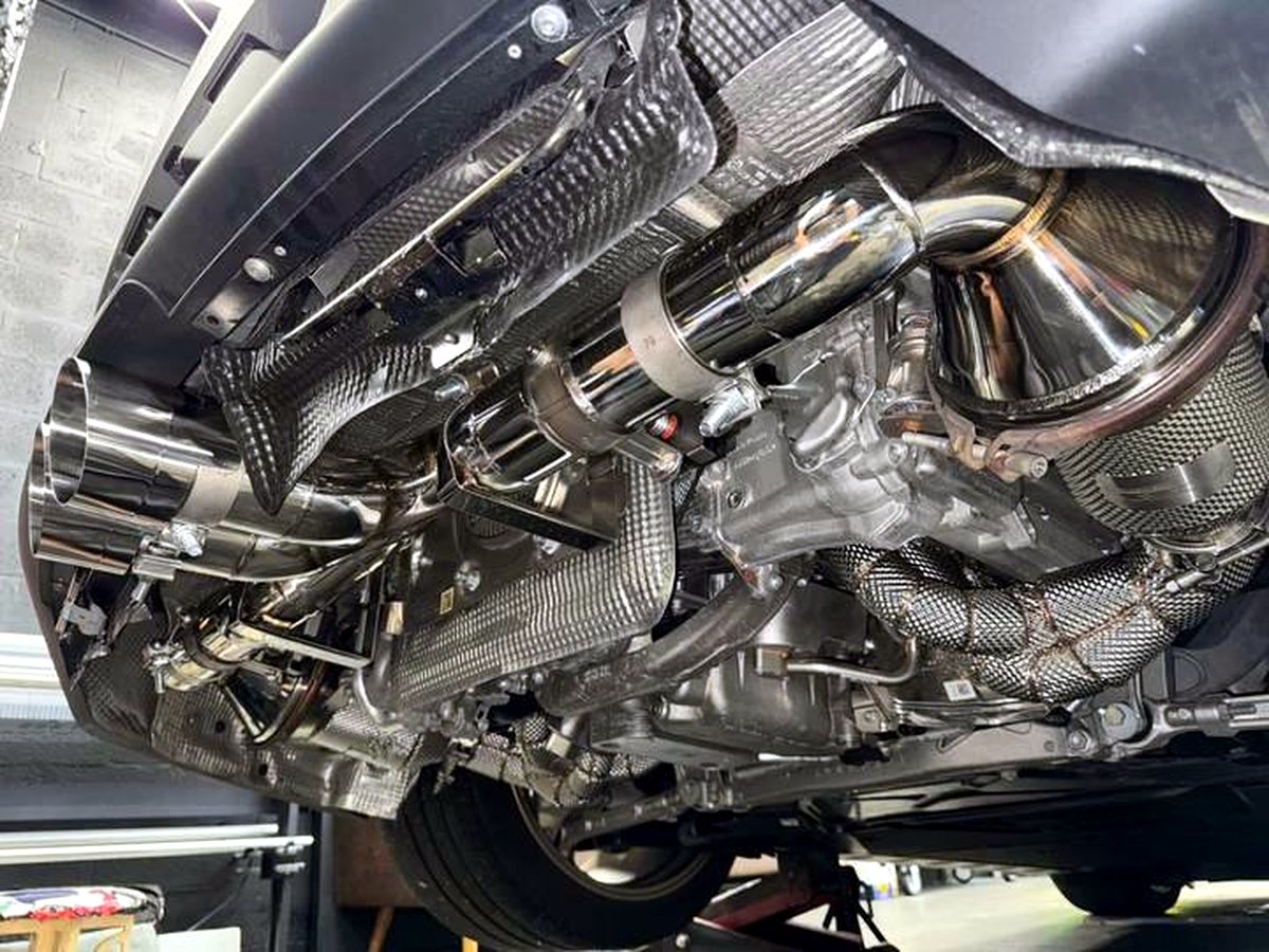 Porsche 992 GT3 RS full exhaust system with carbon air intakes — customer installation