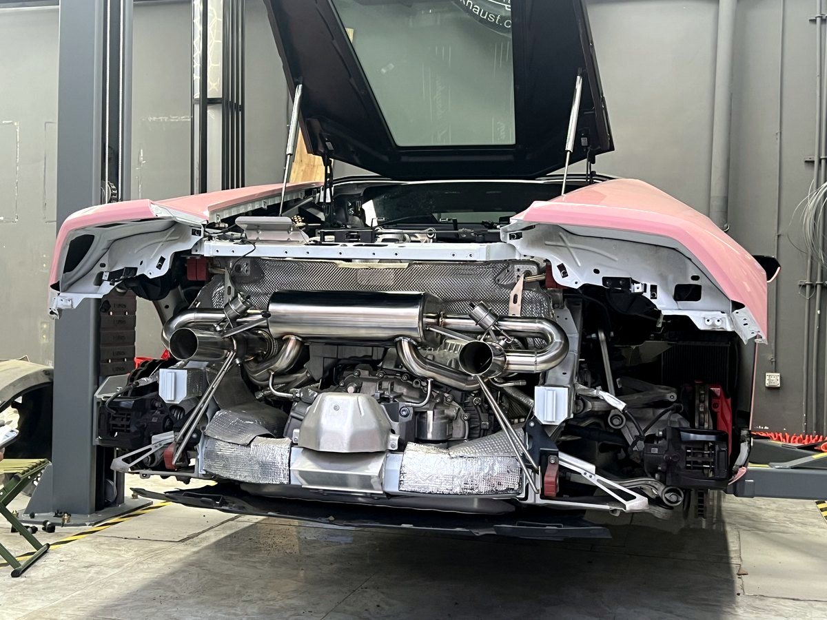 Lamborghini Huracan EVO rear clip off — OUCHI T304 stainless valved exhaust fitted to the V10 — customer installation