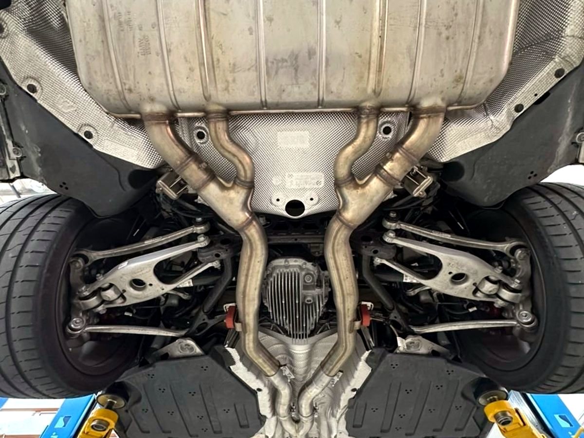 BMW M3 G80 OUCHI stainless steel mid-pipe fitted — customer installation