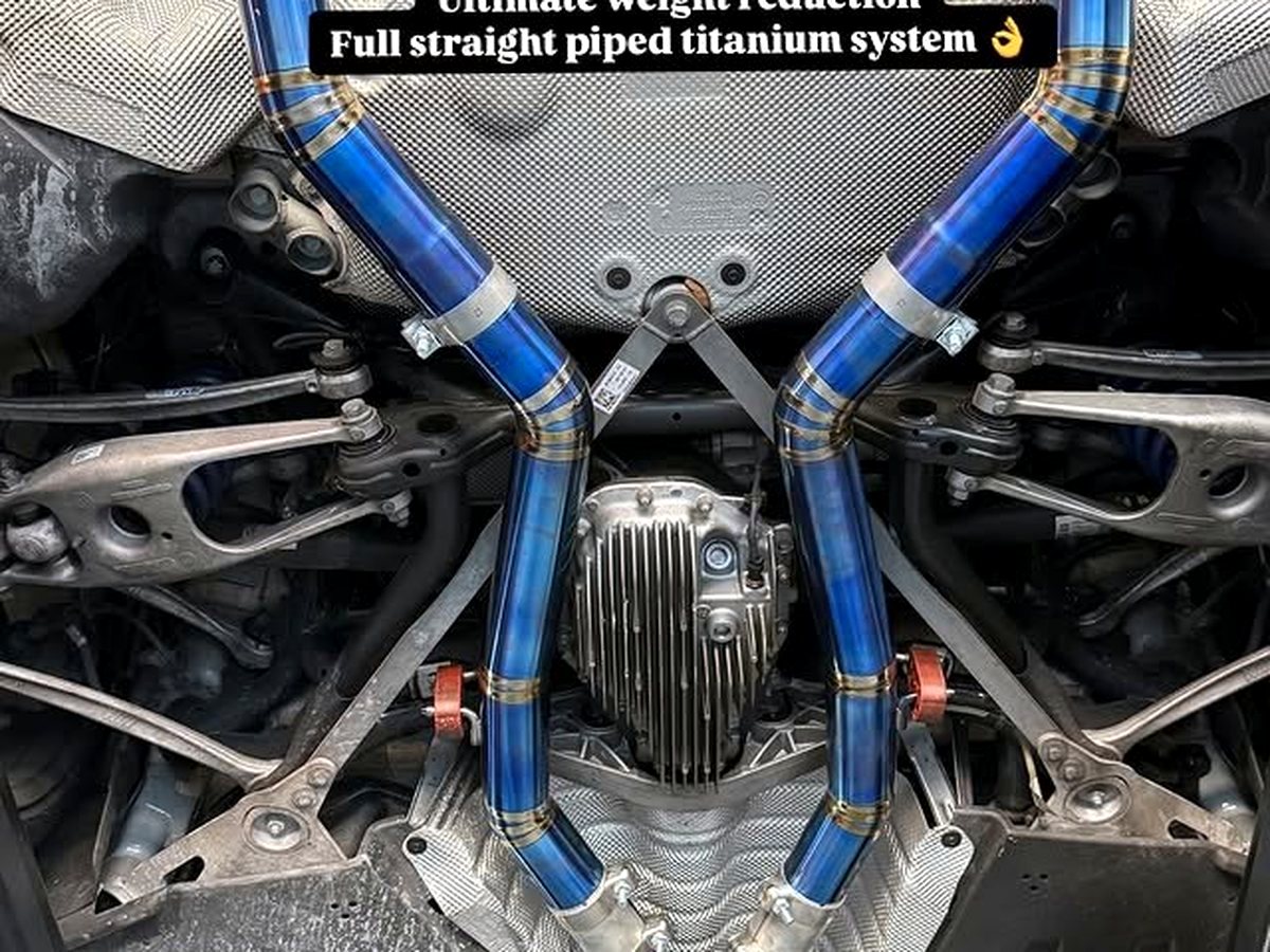 BMW M4 G8X with OUCHI full straight-piped titanium exhaust — customer installation